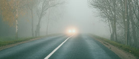 car in fog